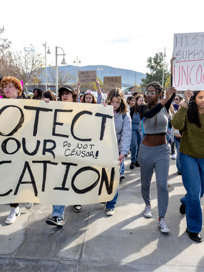 High school students march in protest of the district's ban of critical race theory curriculum at Patricia H. Birdsall Sports Park in Temecula, Calif., on Friday, Dec. 16, 2022.
