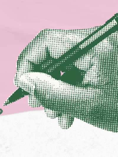 hand filling out ballot