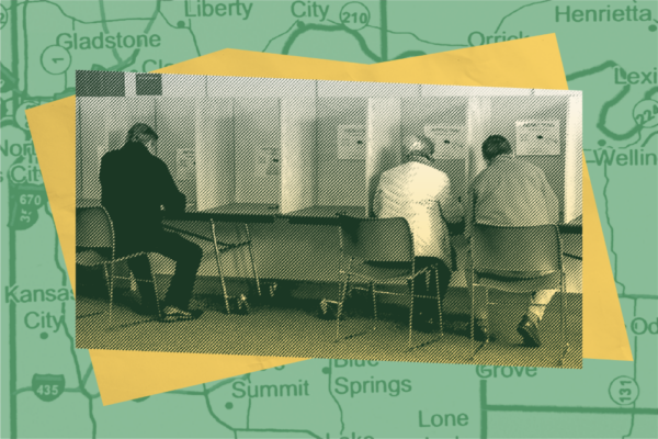 an image of people sitting at polling station