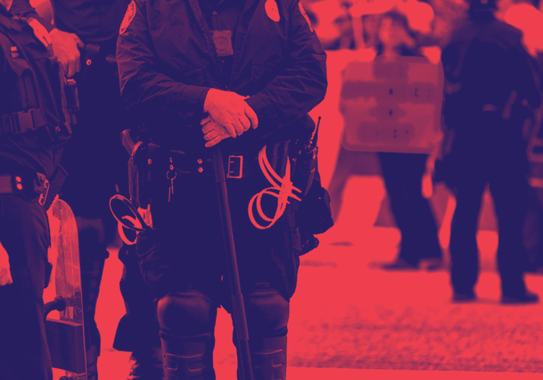 red and dark blue image, police officers standing by with a protester in the background